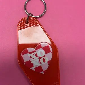 Motel Key Chain Red - Heart-Shaped Design with White and Black Patterns, Ideal for Travel and Everyday Use
