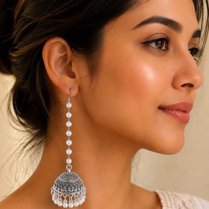 Long pearl chain jhumka silver color earrings with pearl tassels traditional earrings for women. Light weight earrings casual and formal wear, very elegant and comfortable earrings for women.