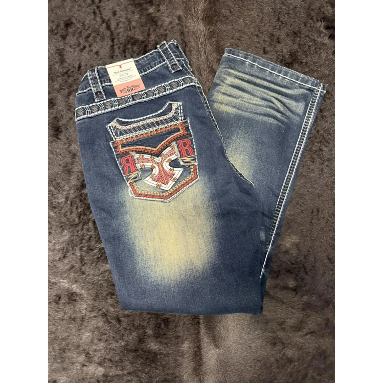 Rock Revolution Red Arrow Jeans with Distinctive Patch Design and Distressed Look
