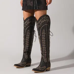 Thigh high denim boots, wide calves, embroidered trousers