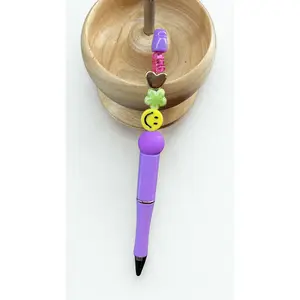 Purple smiley pen