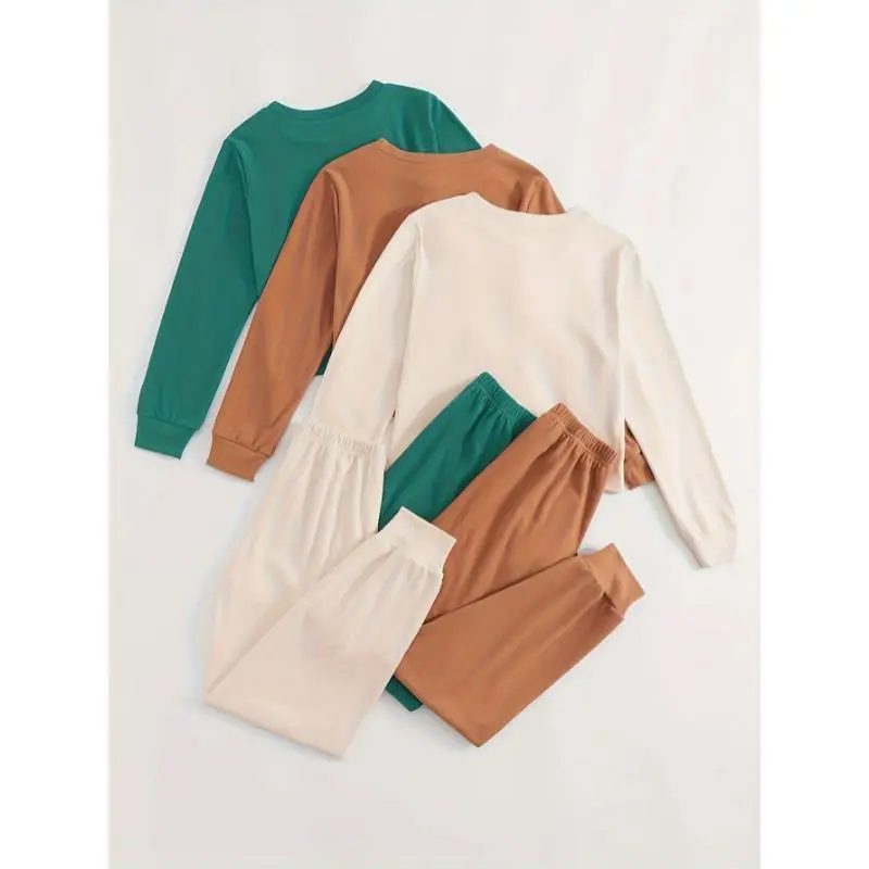 3 Sets of Cozy Women's Solid Casual Lounge Sets - Long Sleeve Round Neck Tops & Jogger Pants for Fall - Comfortable Relaxed Fit, Soft Fabric, and Versatile Style 3 Sets of Cozy Women's Solid Casual Lounge Sets - Long Sleeve Round Neck Tops & Jogger Pants for Fall - Comfortable Relaxed Fit, Soft Fabric, and Versatile Style