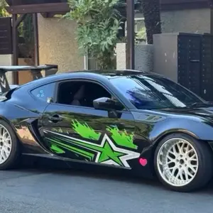 Flame Star Decal for High-Performance Cars with Green Star Design and Bold Flame Effect