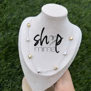 Shop Mima Mixed Metals Mini Heart Necklace - Elegant Silver & Gold Heart Charms on Delicate Chain for Women