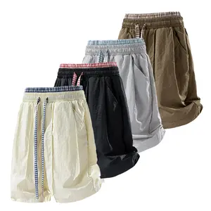 Summer color-block patchwork shorts with drawstring elastic waistband and pockets; men’s outdoor casual quick-dry breathable solid-color loose athletic shorts; American retro streetwear brand; suitable for everyday wear and vacations. summervibes