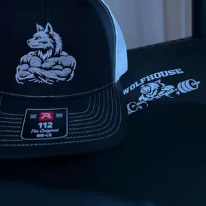 Trucker cap and black tee combo