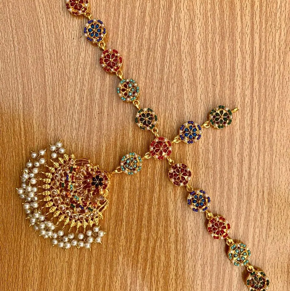 Kundan Stones and Imitation Pearls Nauratan MathaPatti Headpiece with Elegant Design and Rich Finish