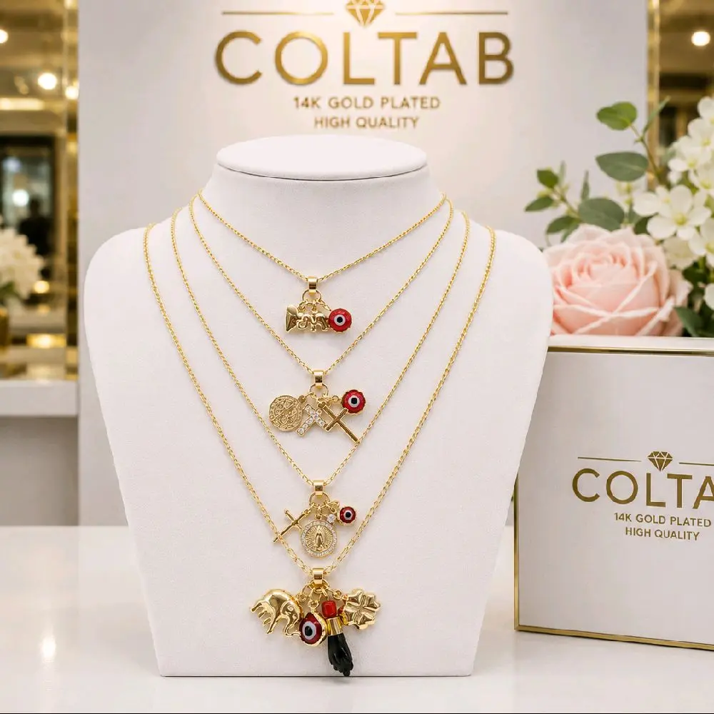 (40 ) . Buena suerte pendant and chain 14k Gold laminated.
