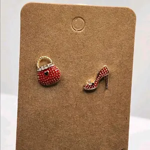 Stilettos and Purse Earrings Metal Coating 3 Colors Fashion Forward Female Jewelry Unique Design Lightweight Comfortable Wear High-Quality Materials Secure Backings Special Occasion Everyday Style Must-Have Accessory