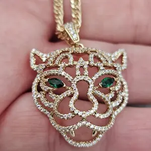 (23)  beautifull woman or men  tiger necklace 14k gold plated   with 20 inches cuban.chain.