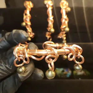 copper wrapped copper bangles with bronze bells
