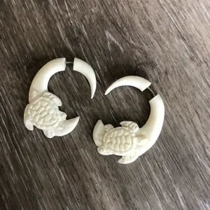 Gorgeous bone carved faux gauge turtle earrings