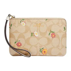 COACH Corner Zip 16 Floral Monogram Wristlet in Coated Canvas and Leather for Women
