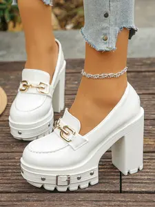 A pair of Women's Platform Block Heel Loafers, Patent Leather Upper, Chunky Studded Lug Sole, Gold Chain Buckle Accent, Edgy Platform Shoes, High Heel Loafers for Parties, Night Out, Street Style, Bold Footwear, Slip-On Design, Trendy Heeled Loafers