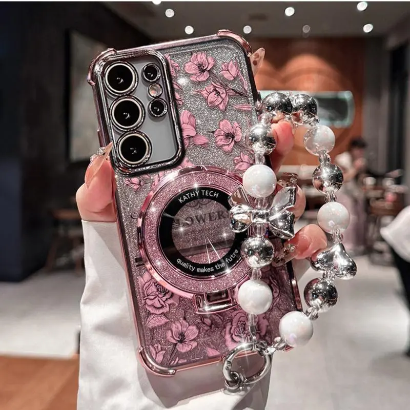 [LX]Flower Suitable For Samsung S21/S22/S23/S24/S25/S24/S25/S26 Ultra Plus Mobile Phone Case Four Corners Anti-Fall Glitter Magnetic Suction Bracket Galaxy High-End Sense Strap Bracelet Protective Case For Girls