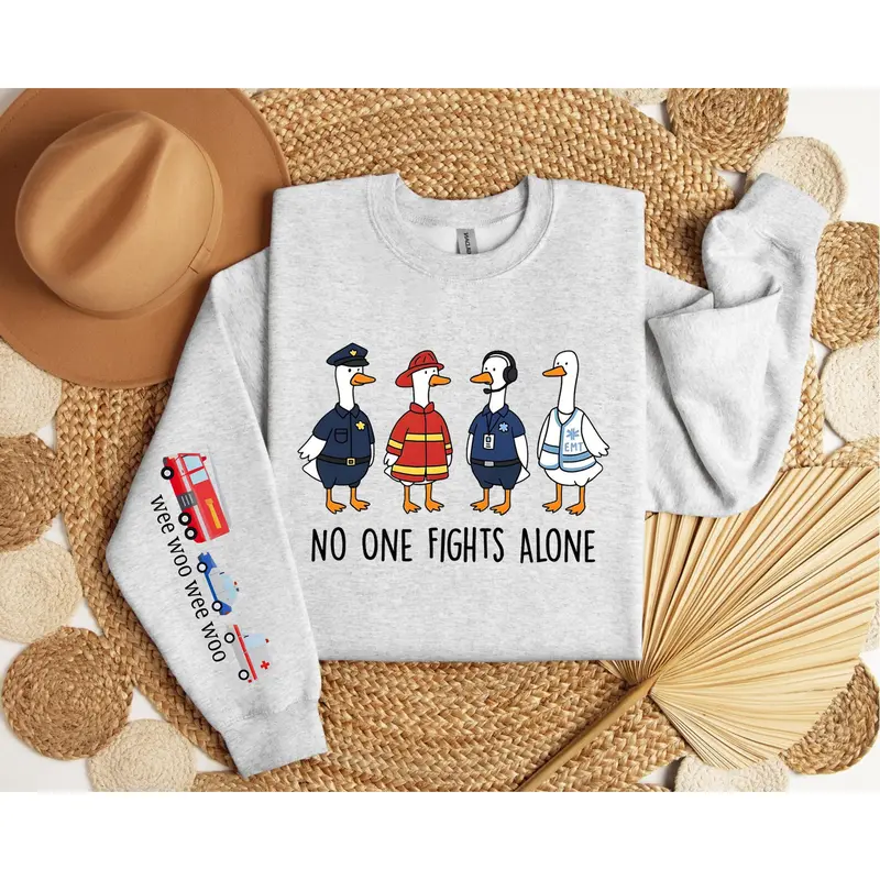 Silly Goose Emergency Department Sweatshirt & Long Sleeve Tee No One Fights Alone 911 Dispatcher Police Firefighter Nurse Wee Woo Wee Woo Shirt Operator Gift Loose Fit Medium Heavy Fabric 8.0 oz/yd² 50% Cotton 50% Polyester Crewneck Unisex