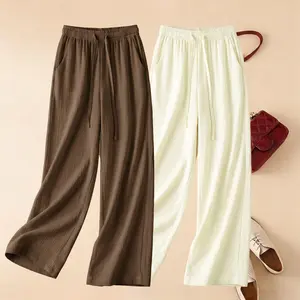 Women’s two-piece set: lightweight casual long pants—loose straight wide-leg design, comfortable elastic waistband with drawstring, pockets included, wrinkle-resistant for everyday wear.