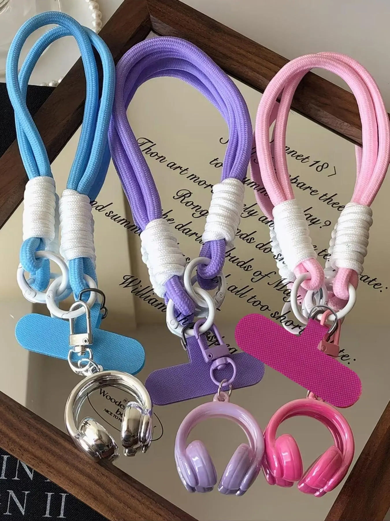 Mini earphone phone lanyard charm, Phone strap, Mobile phone lanyard, Phone Accessory, featuring a dopamine color-blocking Y2K style, comes with an anti-slip pad and a detachable mini earphone charm, can be hung on phones, suitable for daily commuting