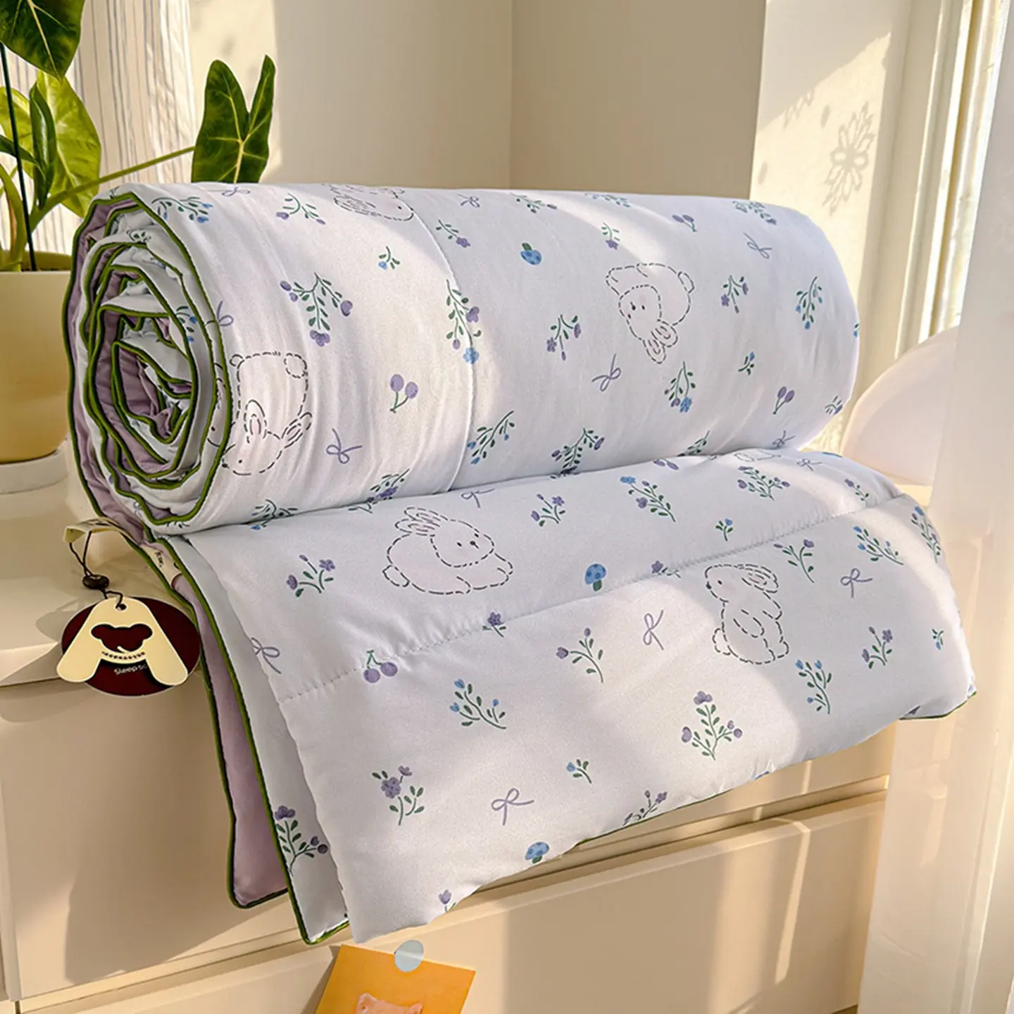 1pcs Purple Rabbit Summer Quilt with Small Floral Print—an ultra-soft, skin-friendly air-conditioning quilt perfect for summer use in bedrooms, offices, and living rooms, ensuring a comfortable night’s sleep Air Conditioned Quilt