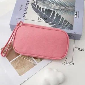 Multi-functional shockproof storage box for storing charging cables, earphone cables, power banks, USB hard drives, SD cards, 7.48 x 4.33 x 2.16 inches, made of premium canvas material, lightweight, sturdy, and wear-resistant protection