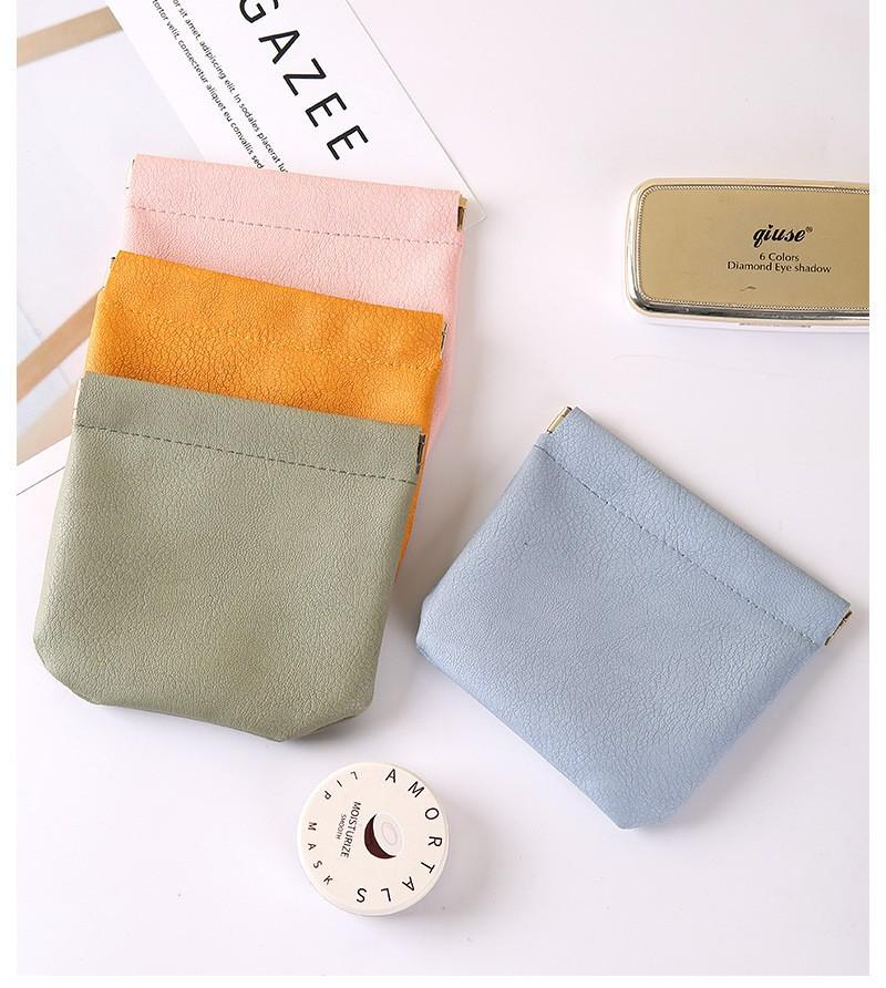 Mini storage bag, key chain, portable cosmetic case, snap fastener, printed lipstick, small bag for carrying odds and ends, portable.