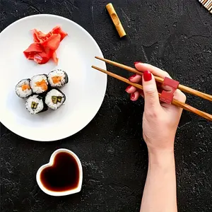 2-piece set of beginner’s chopstick aiders! Lightweight, slip-resistant training chopsticks suitable for adults/newbies, reusable + dishwasher-safe.