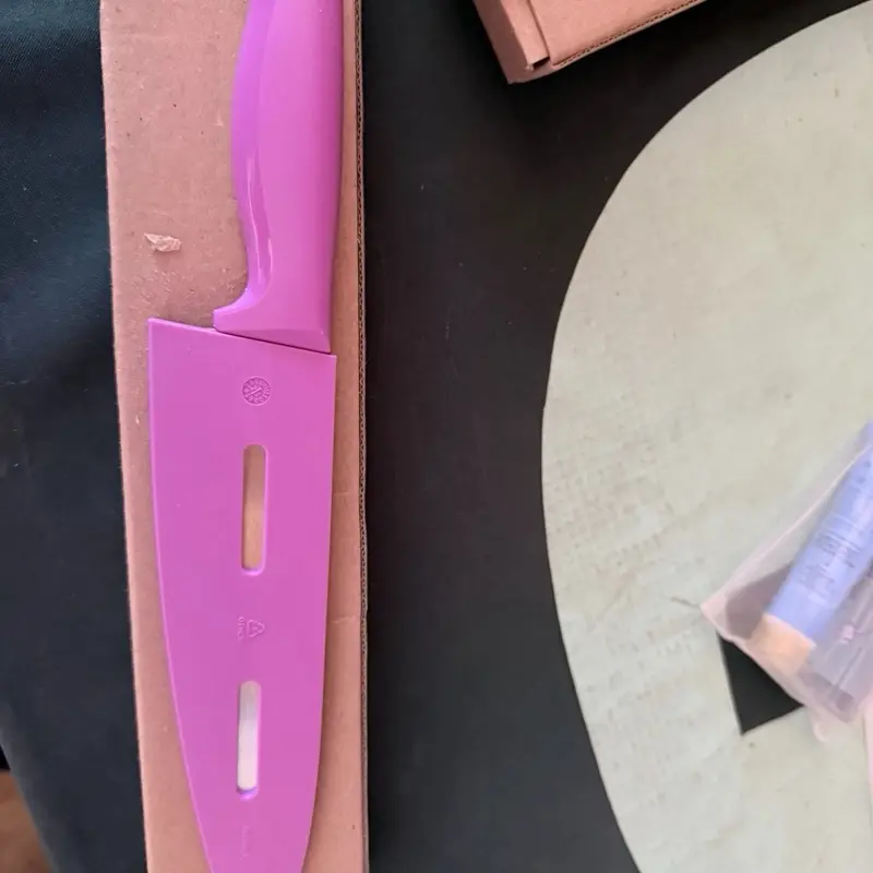 Tupperware knife is on one  you choose your color
