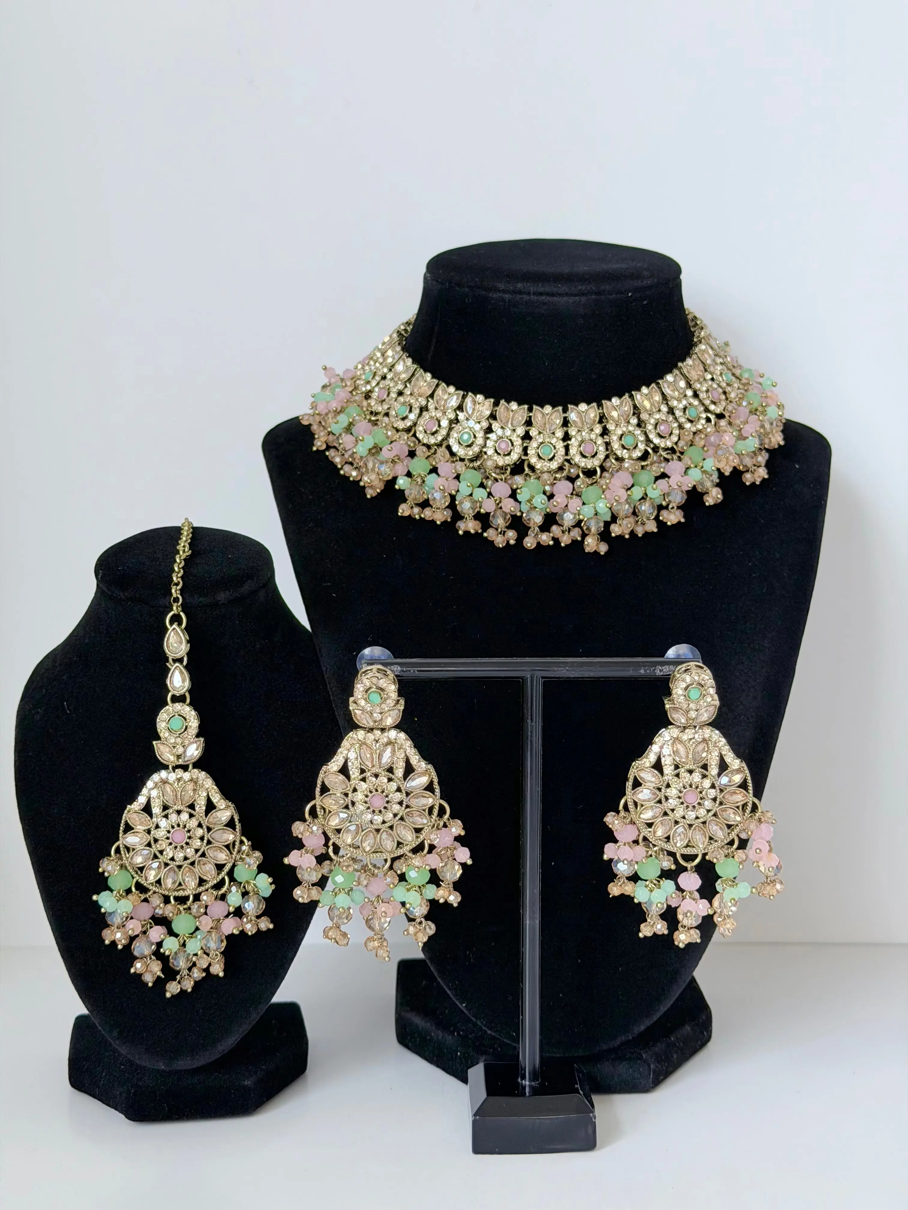 Bollywood Krithika Stonework Necklace Set with Earrings and Mangtika