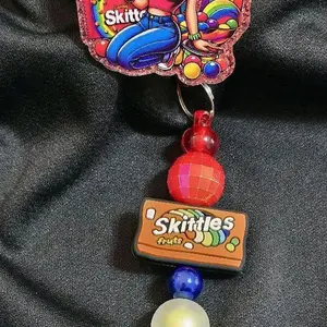 Beaded acrylic badge