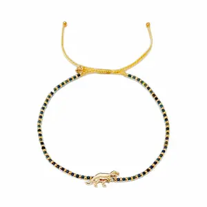 Handwoven Bracelet With Dinosaur Charm