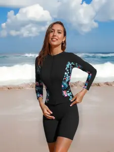 Women's Printed Two-Piece Swimsuit, featuring a long-sleeve top and shorts ideal for water activities
