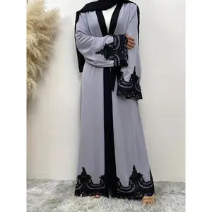 Elegant long sleeved ultra modern dress compared to lace kaftan, open top, women's formal wear