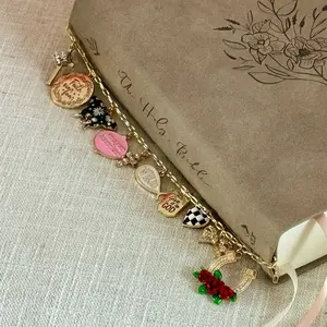 PLEASE READ- Bible Charm Chain - Faith Over Fear with meaningful Charms/Gold Tone **Butterly Pattern may vary** Prayer warrior charm is out of stock. JESUS SAVES charm in place of prayer warrior. Please see pictures before ordering.