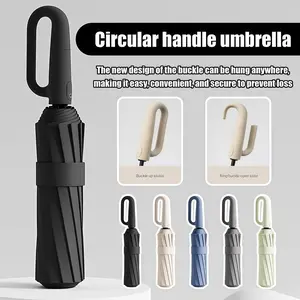 Automatic umbrella rib windproof design with loop closure, portable folding travel umbrella suitable for both men and women, thickened wind-resistant outdoor essential fashion accessory