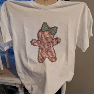 Brand New Christmas Graphic T-Shirt Size XL and Large with Festive Gingerbread Man Design