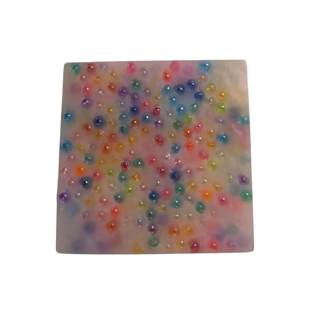 Silicone Rainbow Sensory Pad Sold W/ String