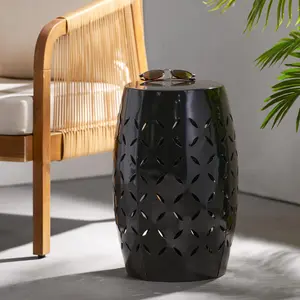 Black small drum table with laser cut hollow out holes weighted base no tipping for balcony succulent display