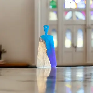 The Crafted Edge cutting board hand crafted with resin and live edge wood coastal colors wall art serving board