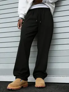 Unisex Minimalist Solid Black Oversized Sweatpants – Premium Heavyweight Fabric, Relaxed Straight-Leg Fit, Modern Urban Casual Aesthetic, Perfect for Effortless Street Style, Durable & Versatile, Ideal for Daily Wear/Minimalist Outfits