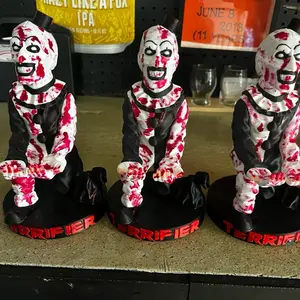 Terrifier Controller/Phone Holder - Unique Design with Bloody Pattern and "Terrifier" Text on Base