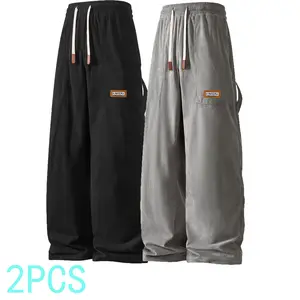 Men’s solid-color drawstring pants with curved hem design—casual and comfortable, loose fit, for summer. Streetwear men’s pants—ideal for everyday wear and layering. Men's Casual Pants for Everyday Wear