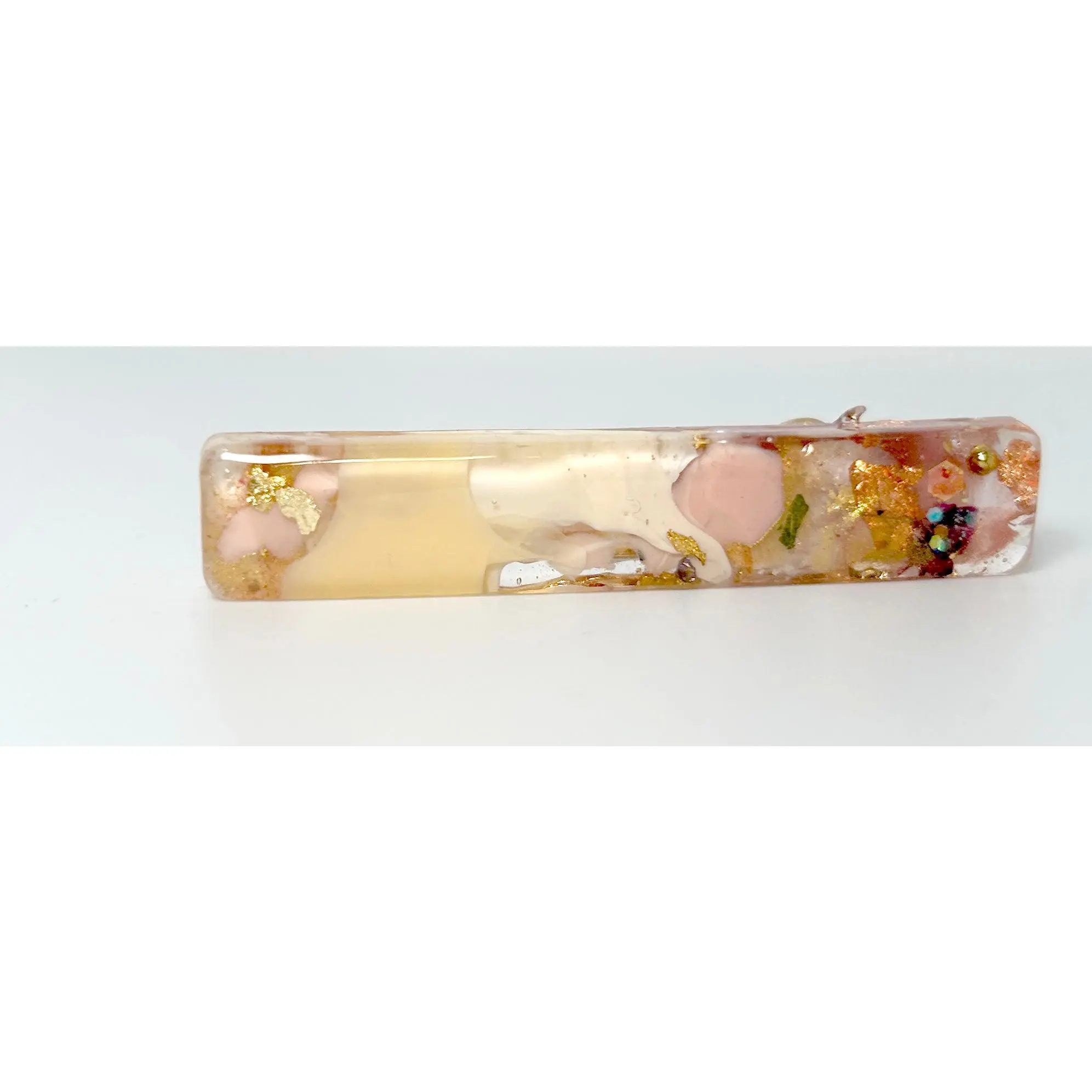 Two UV Resin Hair Barrettes Handcrafted, Metallic gold accents, Small dried flowers, Cream base Iridescent, Gold color alligator clasp. Unique, Multilayered Design with Shimmering Hues