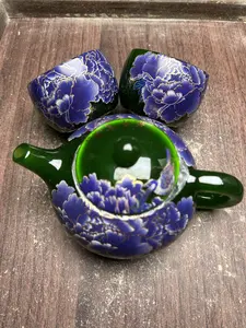 Color-Changing Green Peony Teapot Set with Golden Accents