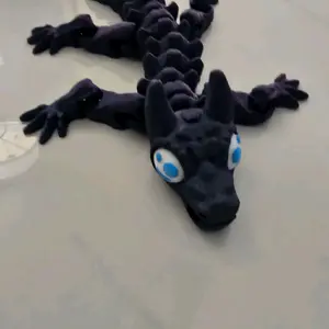3D Printed Black Dragon Figurine with Blue Eyes and Detailed Scales for Collectibles and Home Decor