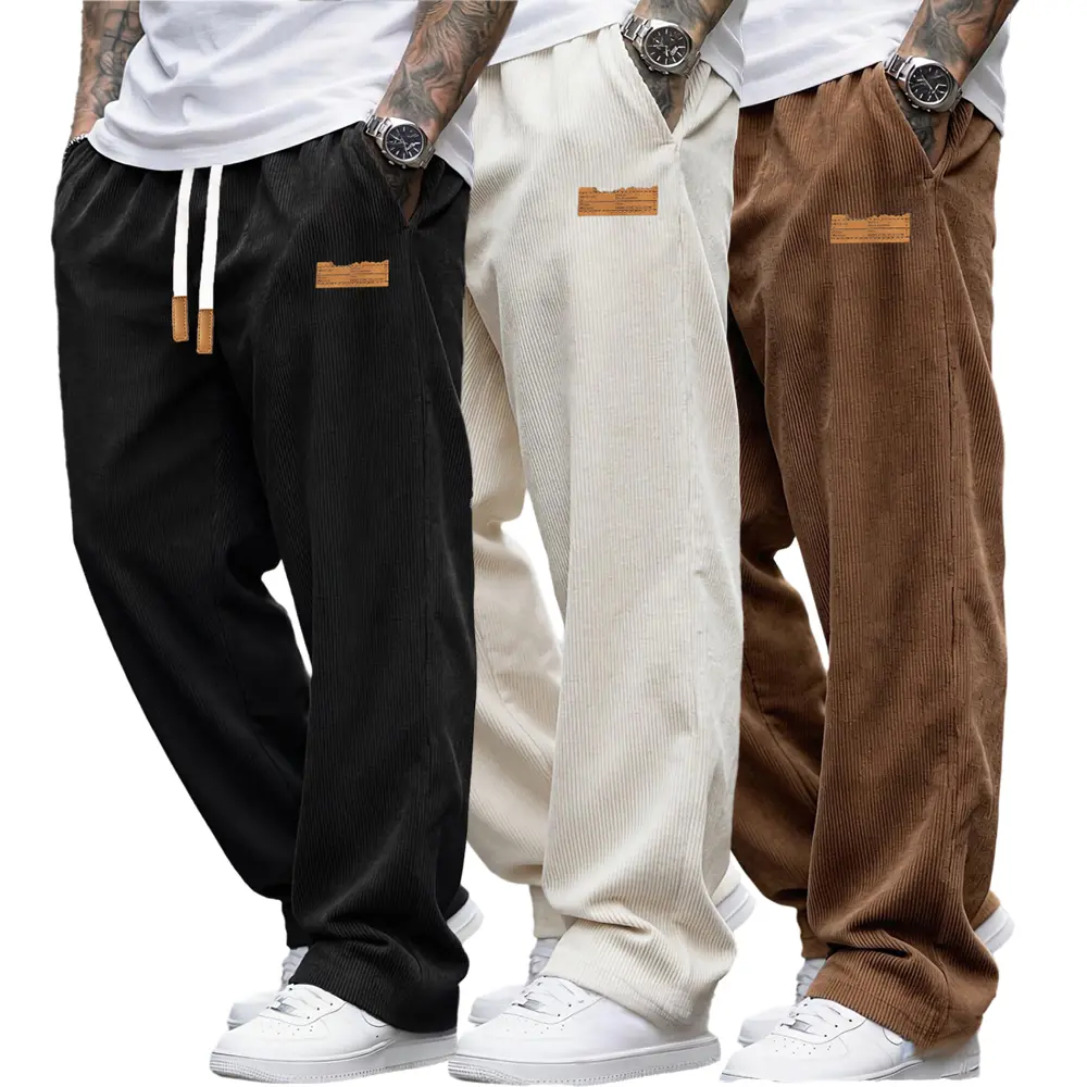 Men’s wide-leg casual pants (3-pack) — menswear featuring an elastic waistband with drawstring adjustment, small leather patch details, a stylish soft fit, long pants suitable for everyday walking and street-style outfits.