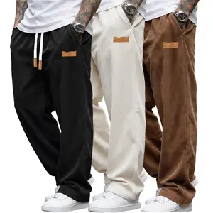 Men’s wide-leg casual pants (3-pack) — menswear featuring an elastic waistband with drawstring adjustment, small leather patch details, a stylish soft fit, long pants suitable for everyday walking and street-style outfits.