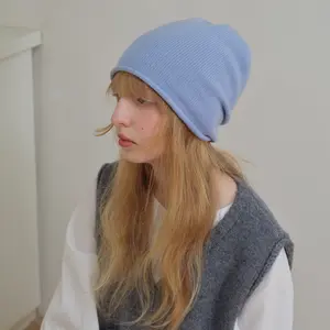 100% Australian wool fine-knit solid color seamless knit beanie for women, suitable for autumn and winter.