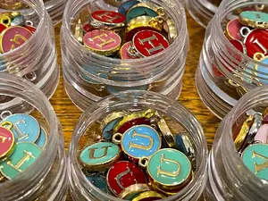 Letter charms–choose black, white, blue, pink, red, yellow, purple or green. Spell name, initials (double sided enamel alphabet jewelry)