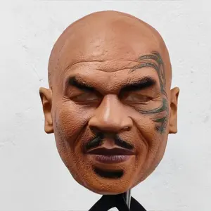 A highly realistic legendary warrior full-head latex mask. Dark brown, with a tattoo on the left side. Thick beard and goat beard. Suitable for sports/combat-themed role-playing, Halloween/themed parties, pranks, and short video production.