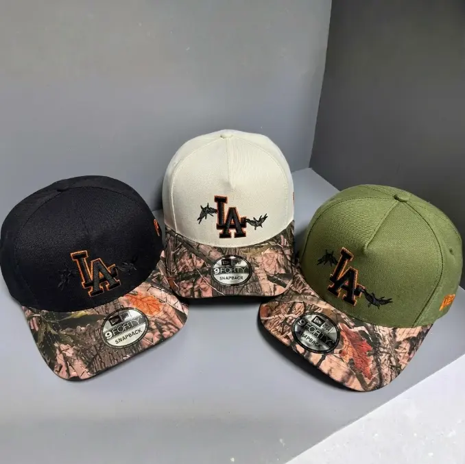 New Era LA Black Hunting Camo Snapback Hat, Premium 9FORTY Adjustable Unisex Cap, Orange Embroidered Logo, Retro Streetwear, Fall Outdoor Fashion, Halloween Holiday Gift, Trucker Hat, USA 2026 Urban Fashion Trend, TikTok Viral Sports Collectible Headwear